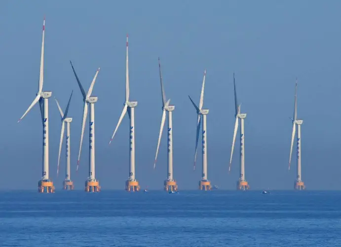 Photo shows a wind farm of China Huadian Corporation Ltd., a major state-owned power producer, in Aiwan Bay of Yuhuan city, east China's Zhejiang province. (Photo by Duan Junli/People's Daily Online)