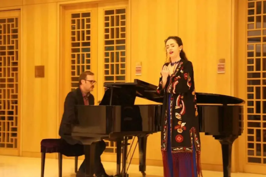 Photo shows Phoebe Haines with her supervisor, Professor Blake Stevens, performing "The Conception and Interpretation of Chinese Art Songs" concert at Peking University's Stanford Center, April 2023. (Photo provided by Phoebe Haines)