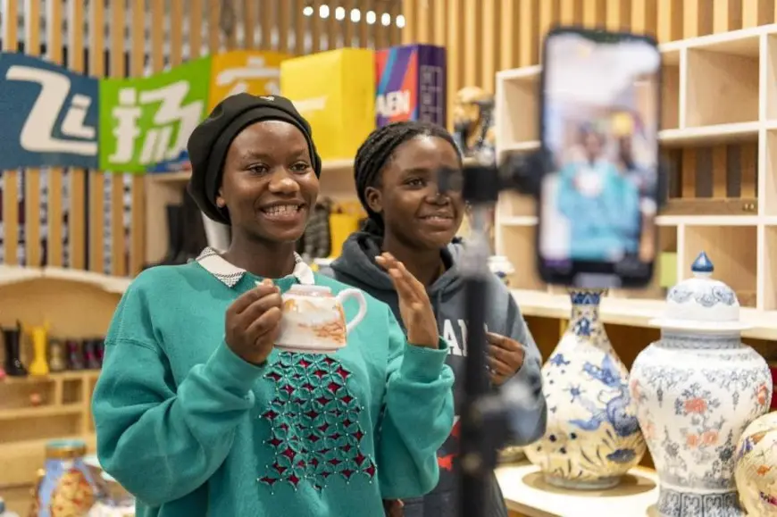 Rwandan students learn to sell products via livestream at the Business School of Jinhua University of Vocational Technology in east China's Zhejiang province, June 25, 2024. (Photo by Hu Xiaofei/People's Daily Online)