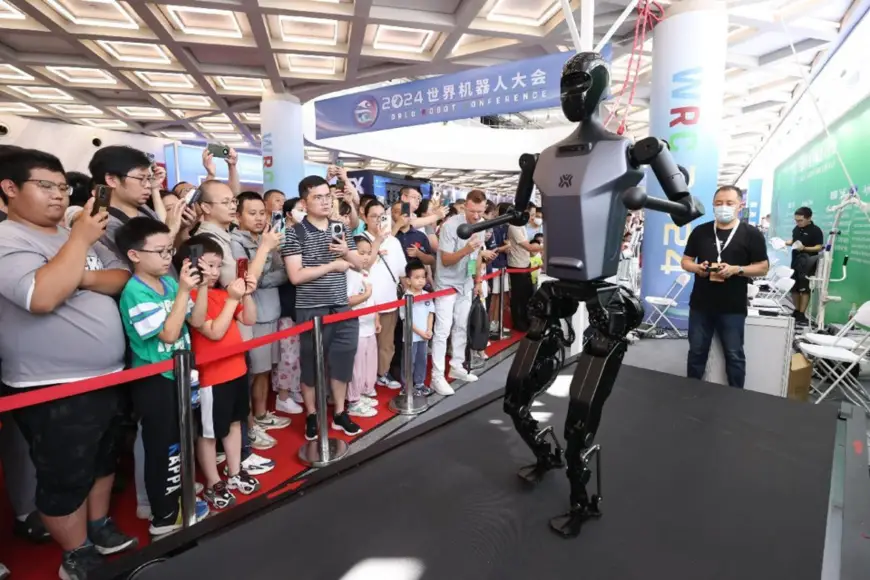 A humanoid robot showcases its ability to run at the 2024 World Robot Conference held in Beijing, August 22, 2024. (Photo by Chen Xiaogen/People's Daily Online)