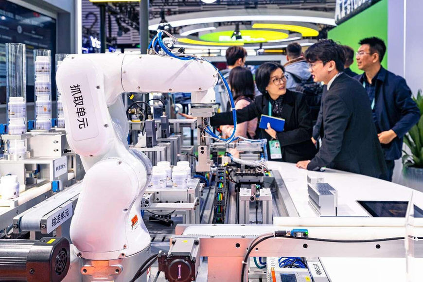 Visitors look at the AI applications in intelligent scenarios at the Light of Internet Expo during the 2024 World Internet Conference Wuzhen Summit in the water-town of Wuzhen, east China's Zhejiang province, Nov. 19, 2024. (Photo by Zhang Feng/People's Daily Online)