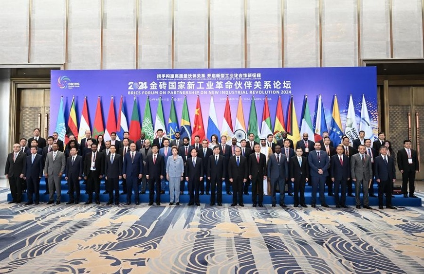 Participants of BRICS Forum on Partnership on New Industrial Revolution 2024 pose for a group photo in Xiamen, southeast China's Fujian Province, Sept. 10, 2024. (Xinhua/Lin Shanchuan)