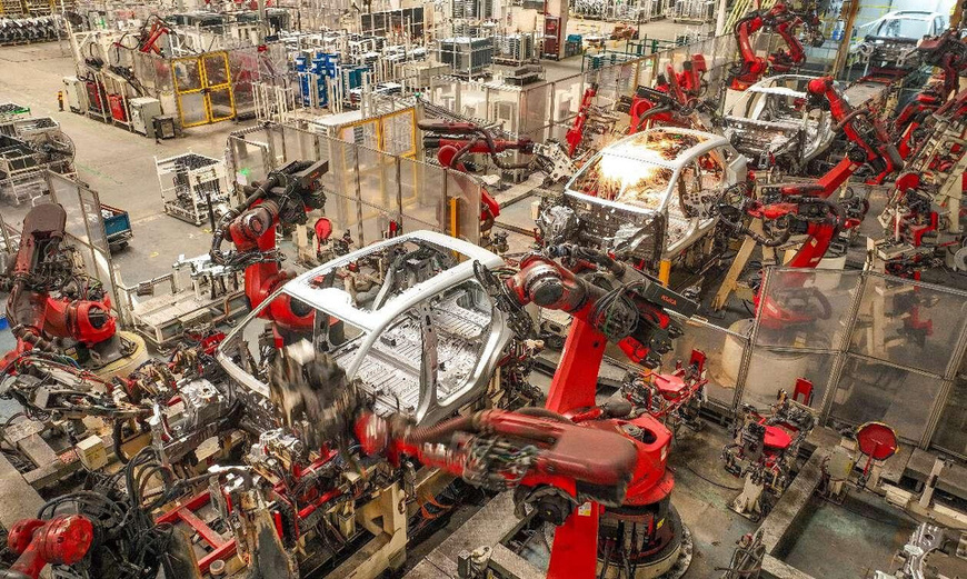 Frames of new energy vehicles are assembled in an automated workshop of Chinese automobile company Leapmotor in Jinhua, east China's Zhejiang province. (Photo by Jin Sicheng/People's Daily Online)