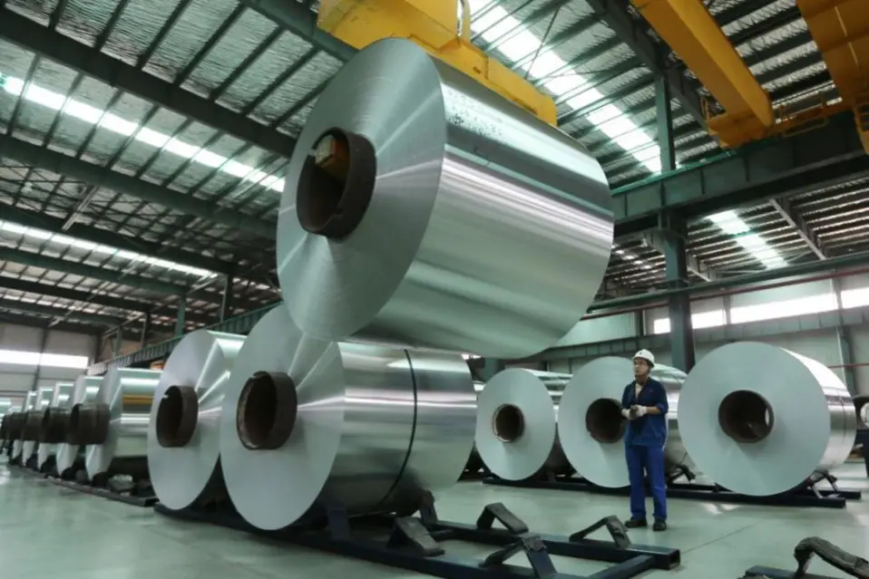 A worker is working at an aluminum production plant in central China’s Anhui province on Aug. 3, 2017. (Photo from CFP)