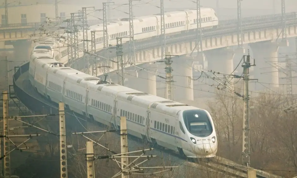 Photo taken on March 1, 2019 shows a bullet train running along a rail in Dalian, northeast China’s Liaoning province. (Photo by Liu Debin from People’s Daily Online)