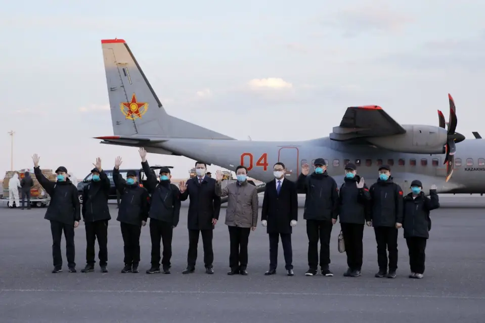 Bringing medical supplies offered to Kazakhstan from China, the team flew two military transport aircraft to Nursultan Nazarbayev International Airport on April 9. (Photo by Chinese embassy in Kazakhstan)