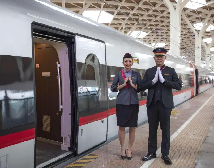 Attendants welcome passengers at the Halim Station, Jakarta. (Photo by Ren Weiyun)