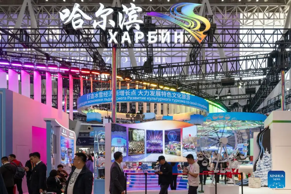 People visit the pavilion of Harbin during the 8th China-Russia Expo in Harbin, northeast China's Heilongjiang Province, May 18, 2024. The expo opened to the public on Saturday. The expo's activities are being held in Harbin from May 16 to 21. Over 5,000 overseas buyers registered at the expo and representatives from 44 countries and regions participated in the expo. (Xinhua/Xie Jianfei)