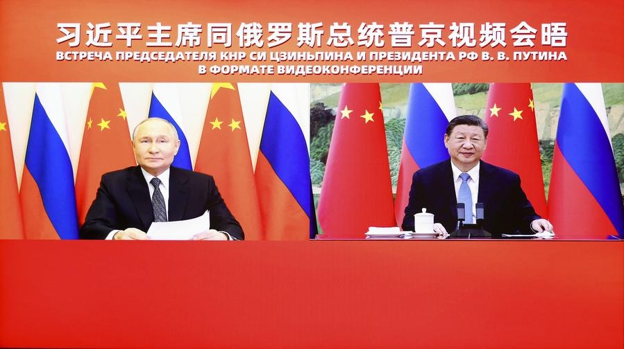 Chinese President Xi Jinping talks with Russian President Vladimir Putin via video meeting at the Great Hall of the People in Beijing, capital of China, Jan. 21, 2025. (Xinhua/Liu Bin)